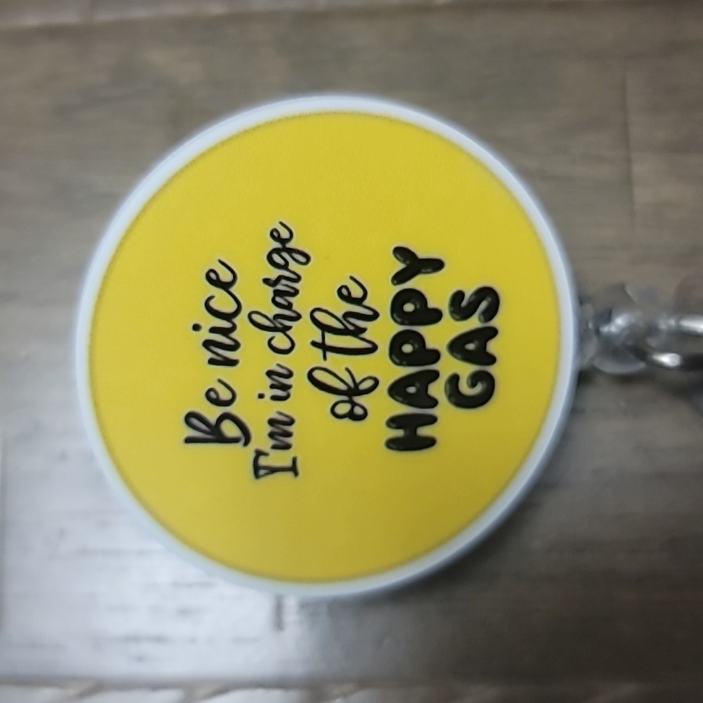 Happy Gas badge reel